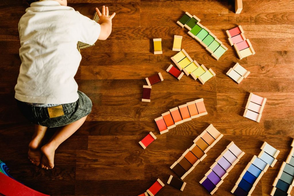 child playing diy color tablets montessori