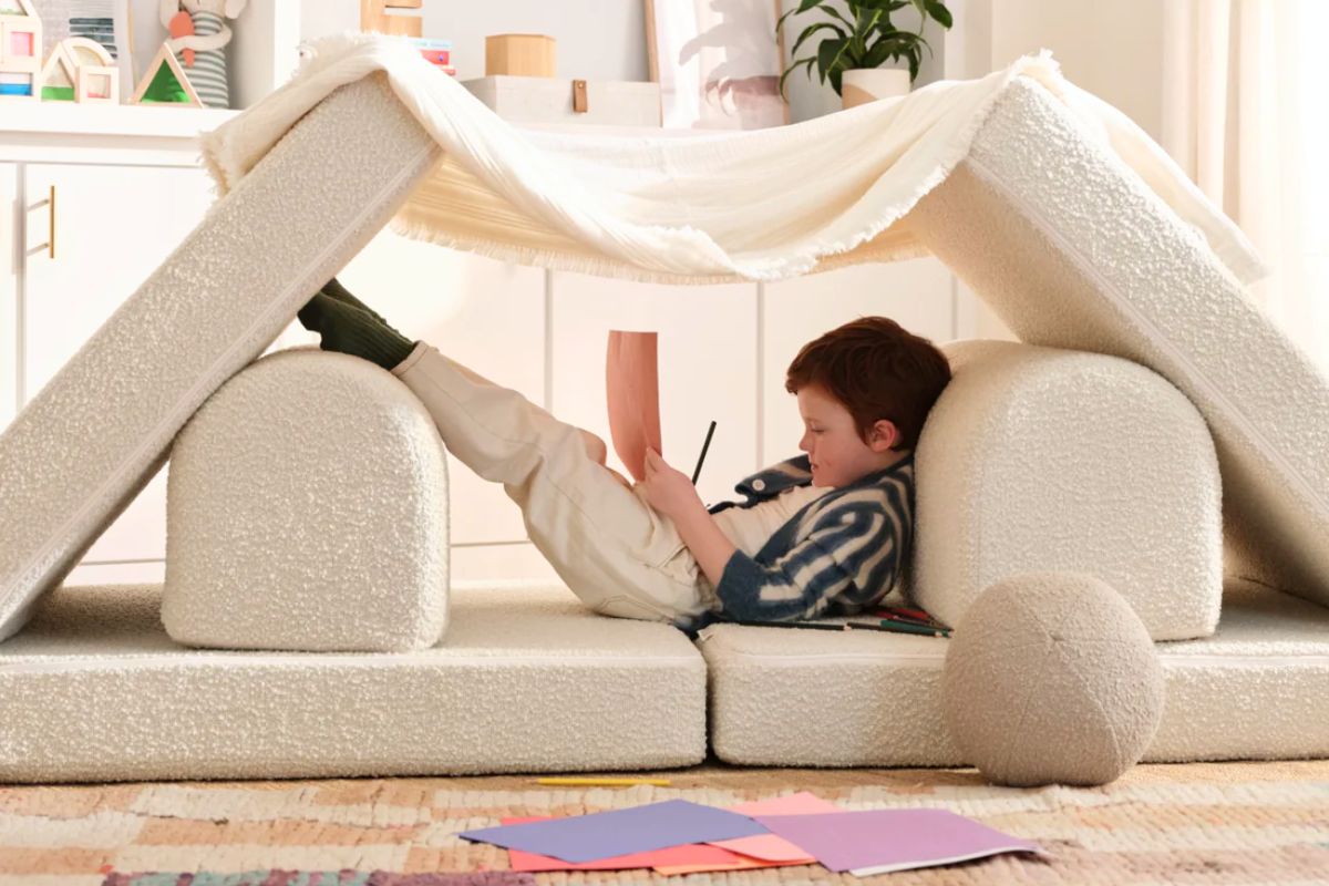 House of Noa modular play couch in striped linen weave fabric, showing the modern furniture design that blends into a family living room while still functioning as a kids play sofa