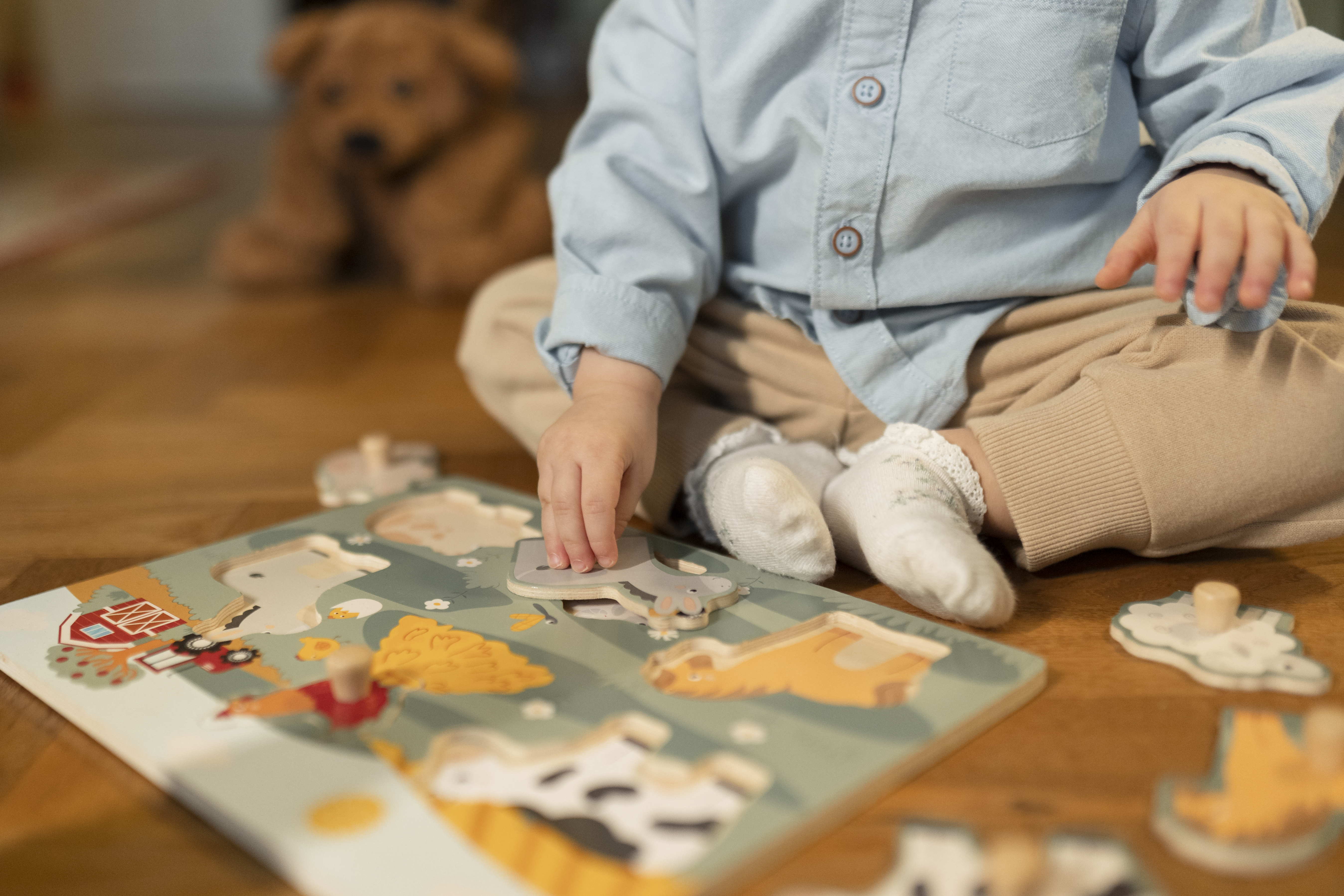 Three-year-old doing a puzzle activity for quiet time