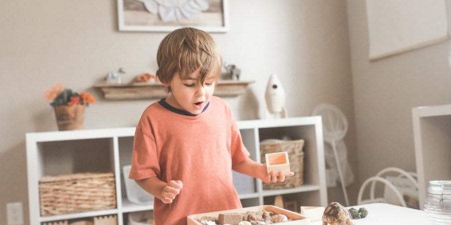 Child at a low shelf