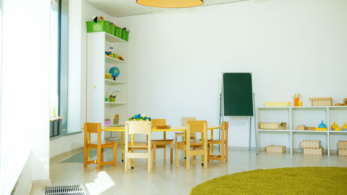 Bright room with low shelves and child-sized tables
